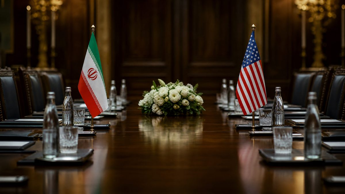Mesa de negociación diplomática con banderas de Irán y Estados Unidos